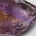 What kind of crystal is clear and purple?