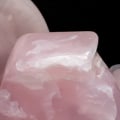 What does a pink and white crystal mean?